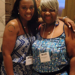 two women smiling